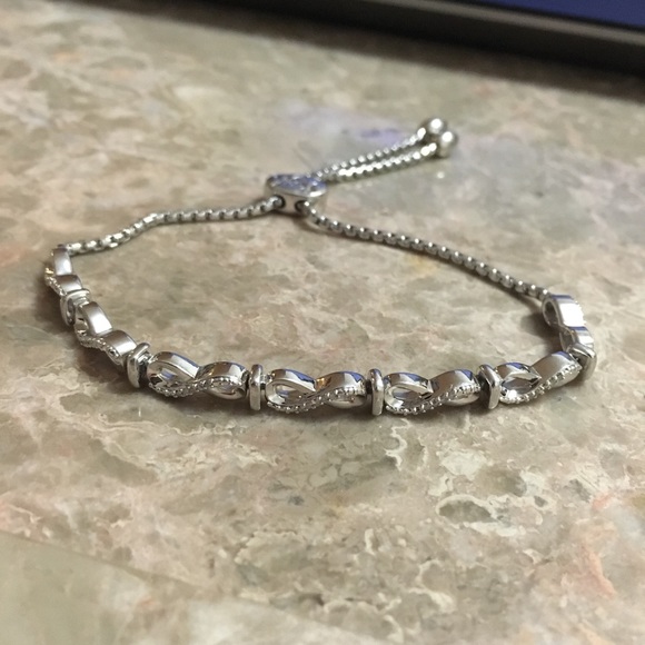 R&M 1/10 CT. T.W. Diamond Sterling Silver Bracelet - Picture 8 of 8